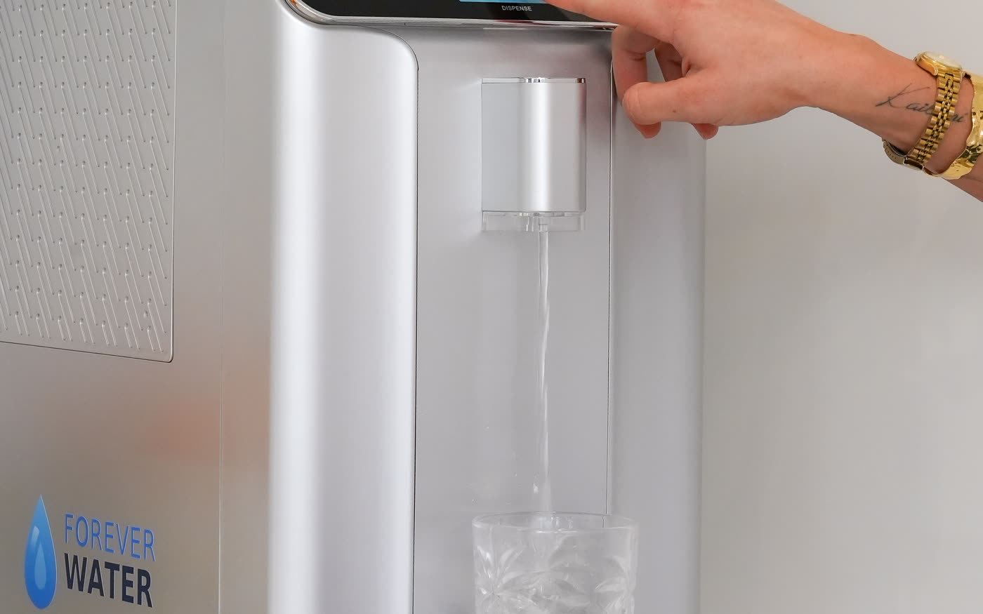 A glass of clean, chilled filtered drinking water on a kitchen bench
